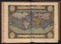 Openliggende atlas met wereldkaart